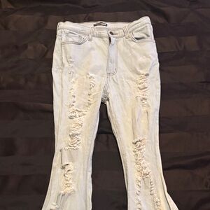 Fashion Nova Light Blue Distressed Flare Jeans